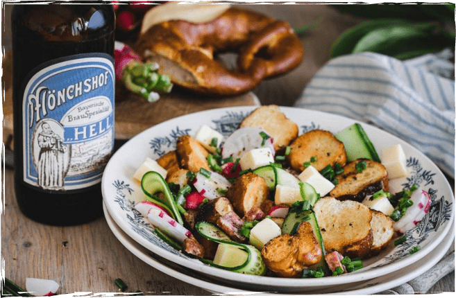 Brezn-Panzanella mit Radi, Bergkäse und Landjägern